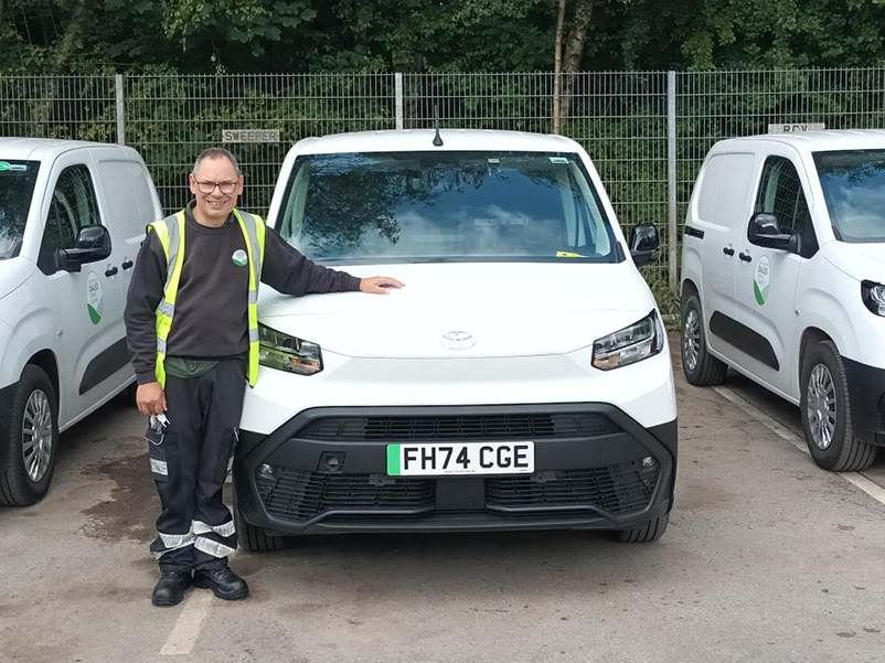 Clean and Green Team worker with one of the new EV vans